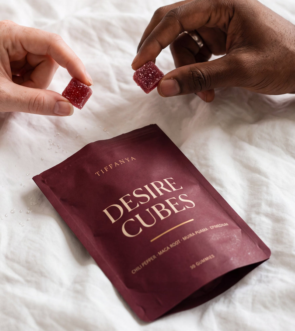 Two hands each taking a Desire Cube above the pouch